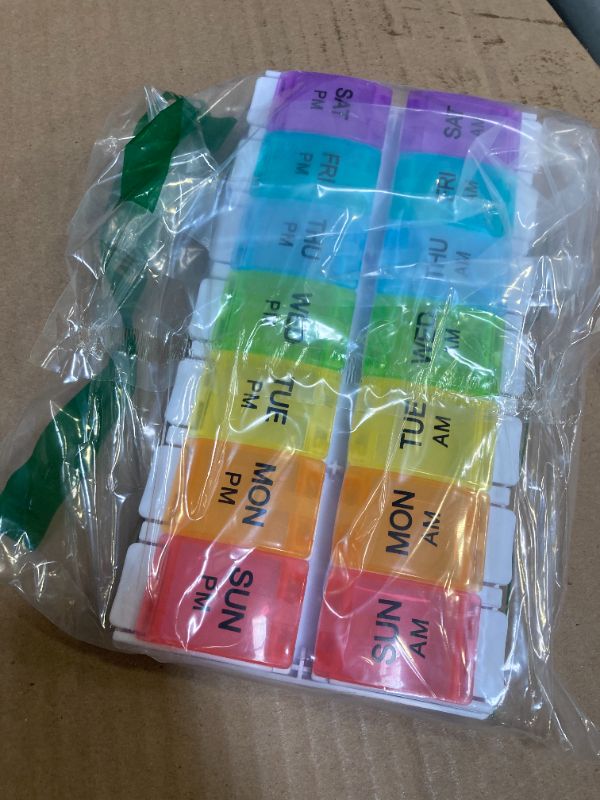 Photo 1 of Sukuos AM PM Weekly Pill Organizer 2 Times A Day, Large Daily Pill Box Case 7 Day with Easy Push Button Design, Detachable Medicine Holder for Vitamin/Fish Oil/Supplements (Rainbow)