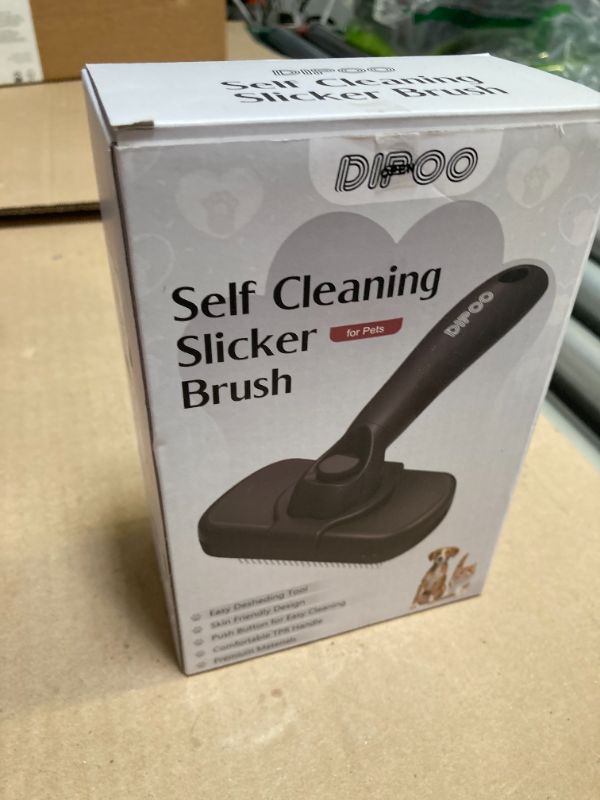 Photo 1 of Dipoo Self Cleaning Shedding Brush - Skin Friendly Grooming Tool for Dogs, Cats, and Puppies, Deshedding and Hair Removal for Long and Short Haired Pets, Black