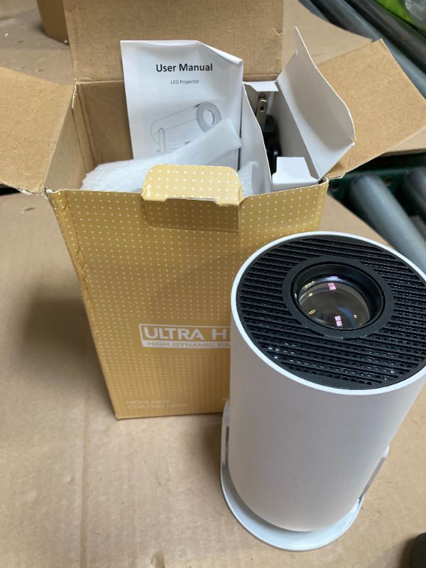 Photo 1 of HY300 Mini Portable Projector, Support 4K 1080P with Dual-Band WIFI6 5G Wireless 5.0 Bluetooth Android 11, 180° Rotatable, Auto Keystone Correction, 35"-130" Screen Video Projector