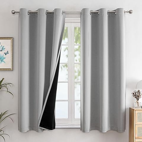 Photo 1 of NICETOWN Modern Blackout Curtains Noise Reducing, Thermal Insulated and Privacy Room Darkening Drape Panels for Boy's Guest Room Door Small Short Window (Natural, 2 Panels, W42 x L54 -Inch)