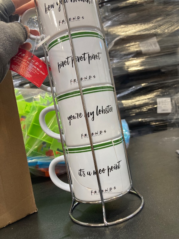 Photo 1 of Silver Buffalo Friends Central Perk Stripe Pattern 4-Pack Ceramic Mug Stack, 10-Ounces