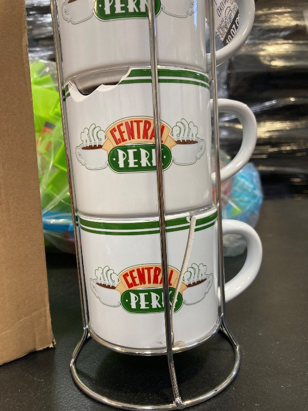 Photo 1 of Silver Buffalo Friends Central Perk Stripe Pattern 4-Pack Ceramic Mug Stack, 10-Ounces