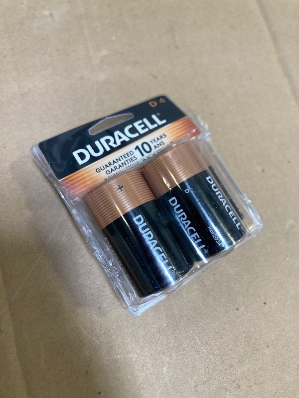 Photo 1 of Duracell Coppertop D Batteries, 4 Count Pack, D Battery with Long-lasting Power, All-Purpose Alkaline D Battery for Household and Office Devices