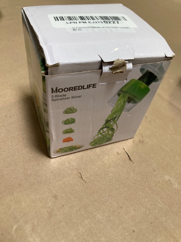 Photo 1 of MOOREDLIFE Spiralizer Handheld Vegetable Slicer