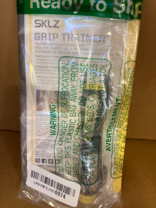 Photo 1 of SKLZ Golf Grip Trainer Attachment for Improving Hand Positioning,Black/yellow