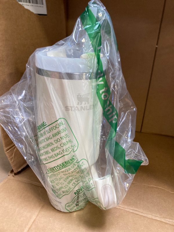 Photo 1 of Stanley Quencher H2.0 Tumbler with Handle and Straw 40 oz | Flowstate 3-Position Lid | Cup Holder Compatible for Travel | Insulated Stainless Steel Cup | BPA-Free | Cream 2.0