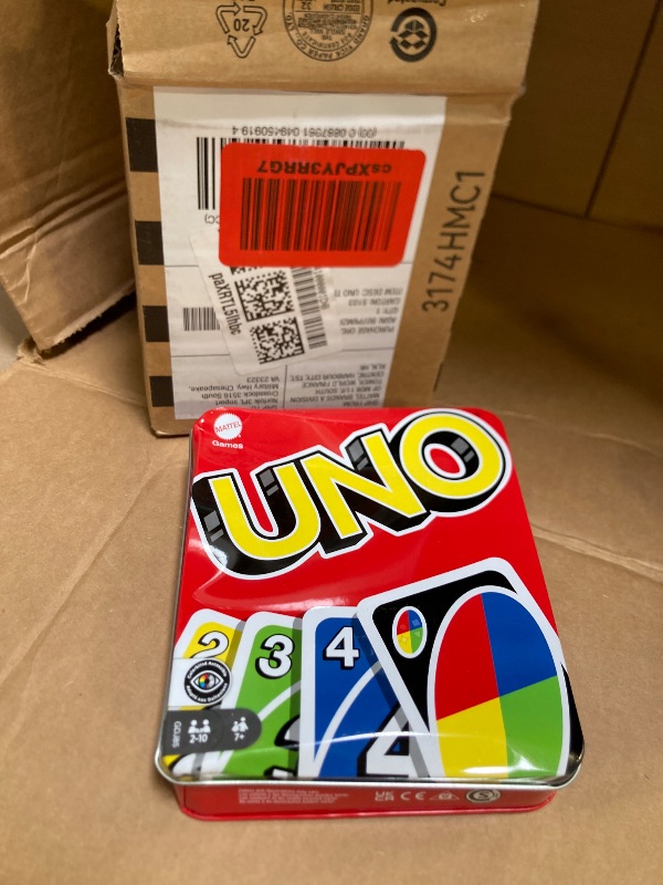 Photo 1 of Mattel Games UNO Family Card Game, with 112 Cards in a Sturdy Storage Tin, Travel-Friendly, Makes a Great Toy for 7 Year Olds and Up