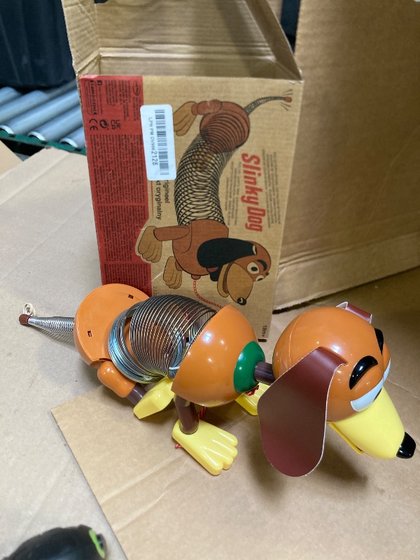Photo 1 of Retro Slinky Dog, The Original Walking Spring Toy, Vintage Spring Toys, Stretches to 14 Inches Long, Kids Toys for Ages 18 Month by Just Play