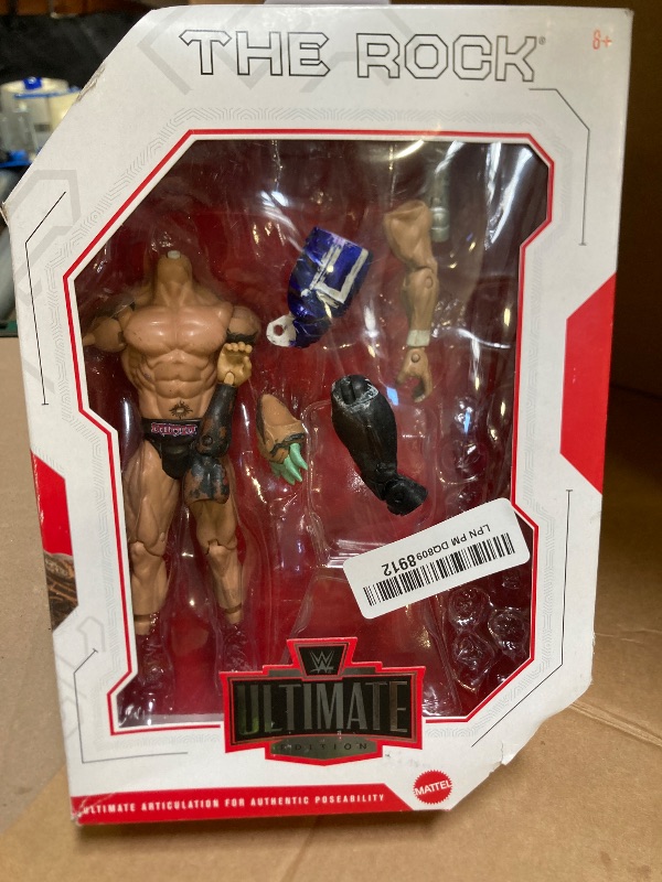 Photo 1 of Mattel WWE Ultimate Edition Action Figure & Accessories, 6-inch The Rock Collectible Set, Swappable Heads & Hands, 30 Articulation Points