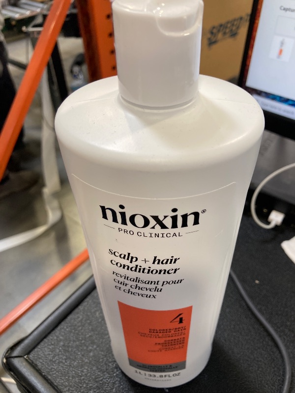 Photo 1 of Nioxin System 4 Scalp + Hair Conditioner | For Colored or Damaged Hair with Progressed Thinning | With Niacinamide and Biotin | 33.8 Fl oz.