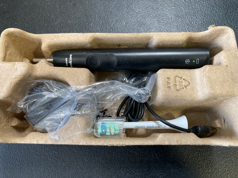 Photo 1 of Philips Sonicare 4100 Rechargeable Electric Toothbrush, with Pressure Sensor, 2 Intensity Settings, SmarTimer and QuadPacer, 14-Day Battery Life, Black, Model HX3681/24
