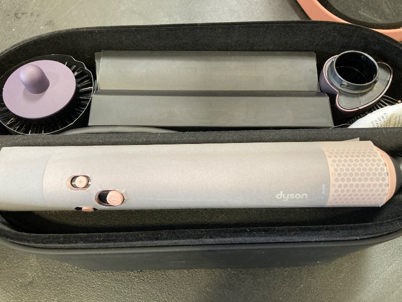 Photo 1 of Limited Edition Dyson Airwrap i.d.™ Multi-Styler and Dryer Straight+Wavy in Jasper Plum