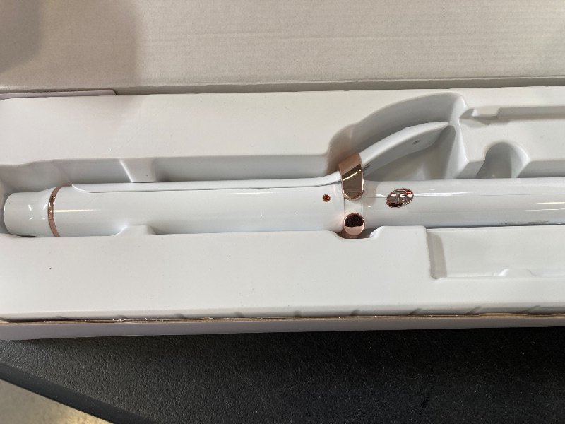 Photo 1 of T3 SinglePass Curl X Extra-Long Barrel Curling Iron with 9 Heat Settings and Ceramic Barrel for Fast Styling and Lasting Results on All Hair Types