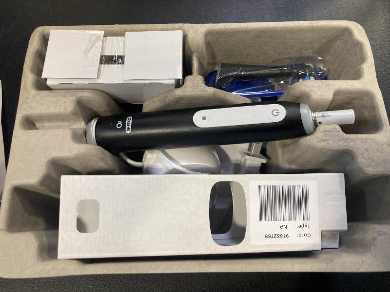 Photo 1 of Oral-B iO3 Electric Toothbrush (1) with (1) Ultimate Clean Brush Head and (1) Charger