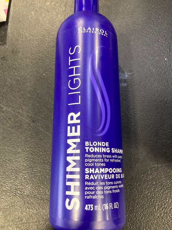 Photo 1 of Clairol Professional Shimmer Lights Purple Shampoo, 16 fl. Oz, Neutralizes Brass & Yellow Tones, For Blonde, Silver, Gray & Highlighted Hair Packaging May Vary
