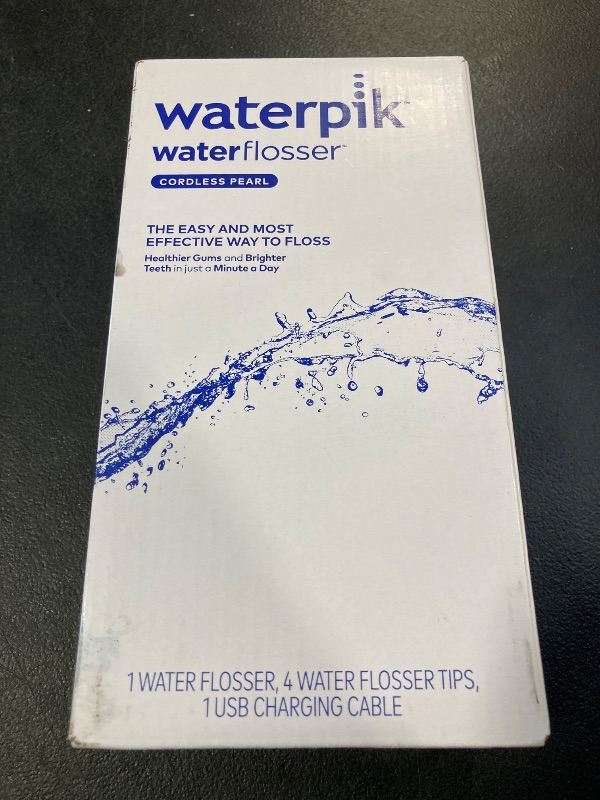 Photo 1 of Waterpik Cordless Pearl Rechargeable Portable Water Flosser for Teeth, Gums, Braces Care and Travel with 4 Flossing Tips - ADA Accepted, WF-13 White, Packaging May Vary