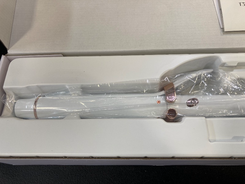 Photo 1 of T3 SinglePass Curl X Extra-Long Barrel Curling Iron with 9 Heat Settings and Ceramic Barrel for Fast Styling and Lasting Results on All Hair Types