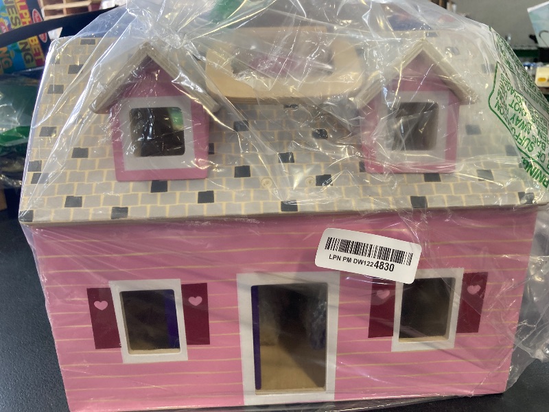 Photo 1 of Melissa & Doug Fold and Go Wooden Dollhouse With 2 Dolls and Wooden Furniture, Multi, One Size