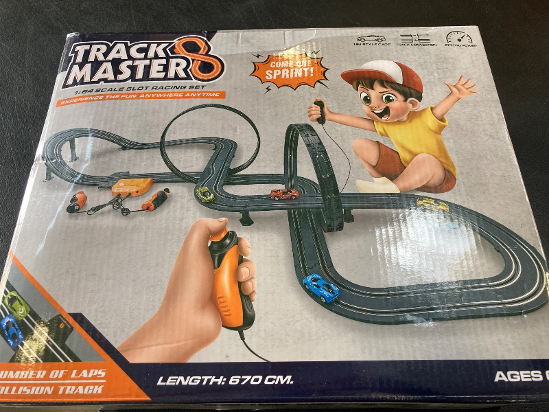 Photo 1 of Slot Car Race Track Sets, 23ft Battery Powered or Electric Track with 4 Slot Cars, Dual Racing Game Lap Counters, Race Track Set Features a Loop, Turns, Straightaways and a Crossover for Boys Age 6-12