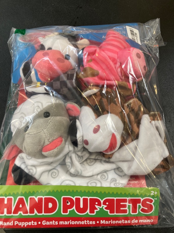 Photo 1 of Melissa & Doug Farm Friends Hand Puppets (Set of 4) - Cow, Horse, Sheep, and Pig