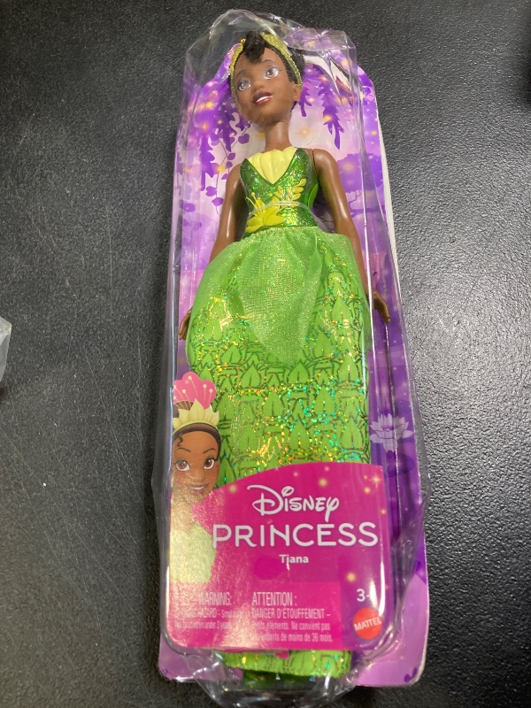 Photo 1 of Mattel Disney Princess Dolls, Tiana Posable Fashion Doll with Sparkling Clothing and Accessories, Disney Movie Toys
