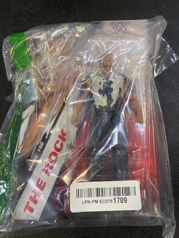Photo 1 of Mattel WWE The Rock Action Figure, Main Event Series #156, 6-inch Collectible Superstar with 14 Articulation Points & Life-Like Look