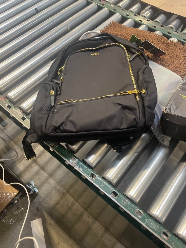 Photo 1 of TUMI - Voyageur Celina Backpack - Women's Work and Travel Bag - 16.0" X 10.6" X 6.5" - Holds Up to 16" Laptop - Black & Gold Hardware
