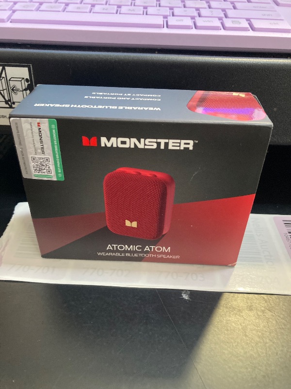 Photo 1 of Monster Atomic Atom Wearable Bluetooth Speaker with Mics for Hands-Free Calls, IPX5 Waterproof, Compact and Portable Speaker for Workout, Cycling, Red