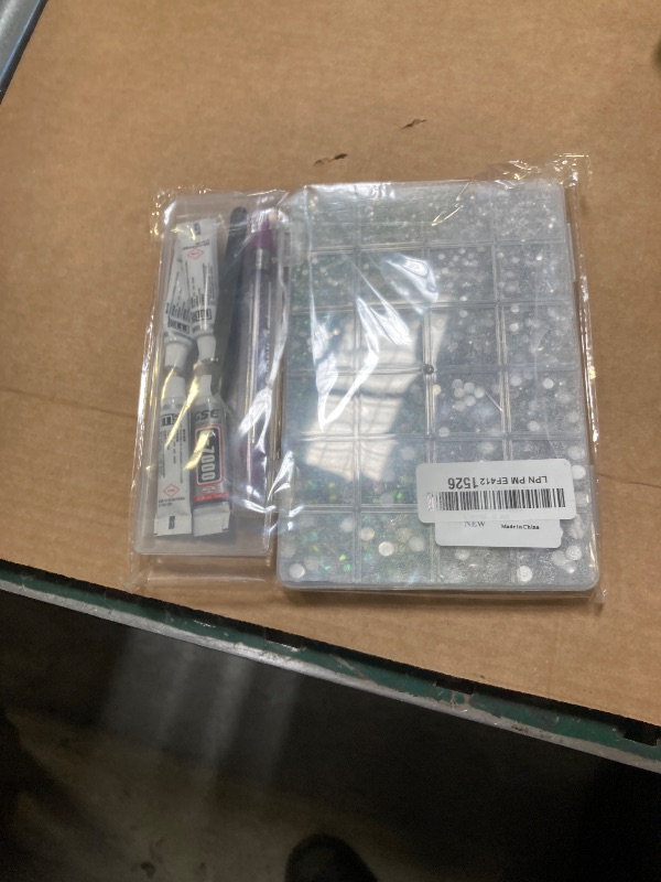 Photo 1 of Canvalite 25000PCS Resin Jelly Rhinestones for Crafting,Clear AB Flatback Gems, Bedazzling Crystal with 5 X 2.5g B7000 Jewelry Glue and Tweezers and Dotting pen for DIY Crafts Clothing Shoes Nail Art