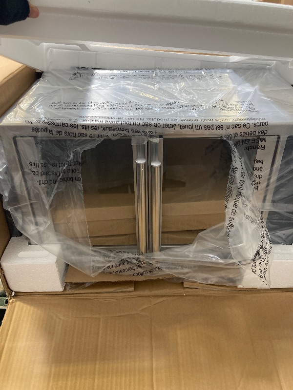 Photo 1 of Oster Air Fryer Oven 10-in-1 Countertop Toaster Large Enough for 2 Pizzas Stainless Steel French Doors XL Sized
