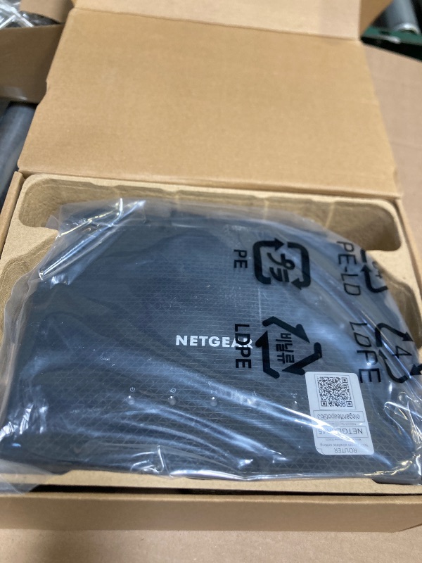 Photo 1 of NETGEAR 4-Stream WiFi 6 Router (R6700AX) – Security Features, AX1800 Wireless Speed (Up to 1.8 Gbps), Covers up to 1,500 sq. ft., 20 devices