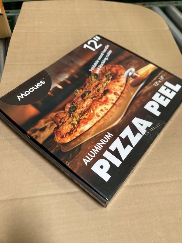 Photo 1 of Pizza Peel Aluminum Pizza Spatula, Mooues 12 inch Metal Pizza Paddle(12"x 14")with Rocker Cutter Foldable Wood Handle, [Storage bag included], for Family Pizza Oven Baking Pizza, Dough, Bread & Pastry