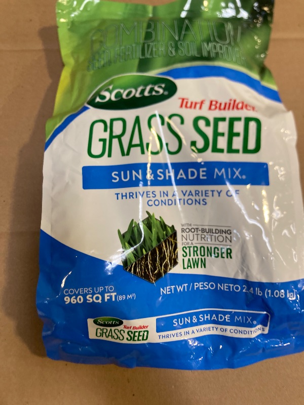 Photo 1 of Scotts Turf Builder Grass Seed Sun & Shade Mix with Fertilizer and Soil Improver, Thrives in Many Conditions, 2.4 lbs.