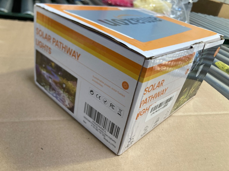 Photo 1 of GIGALUMI 8 Pack Solar Lights Outdoor, Solar Pathway Lights with Great Pattern, Waterproof Auto On/Off Solar Powered Light for Outside Yard Garden Walkway Driveway Lawn Pathway