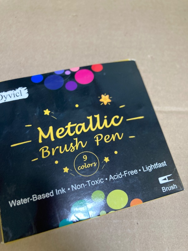 Photo 1 of Dyvicl Metallic Brush Marker Pens - Metallic Pens Art Markers for Calligraphy, Brush Lettering, Black Paper, Rock Painting, Card Making, Scrapbooking, Fabric, Metal, Ceramic, Wine Glass, Set of 9