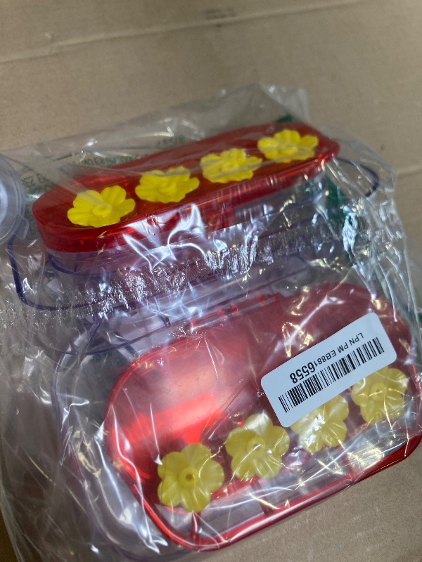Photo 1 of Redboat 2 Pack Window Hummingbird Feeder, Strong Suction Cup Hummingbird Feeder with 4 Feeding Ports, Easy to Clean and Refill Plastic Humming Bird Feeder, 10oz