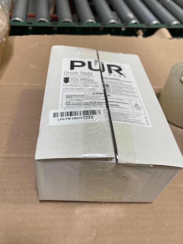 Photo 1 of PUR PLUS Vertical Faucet Mount Water Filtration System, Lead-Reducing Filter, Great-Tasting Water, Easy Install, Lasts 100 Gallons, Compatible with Sinks with External Aerators, Grey