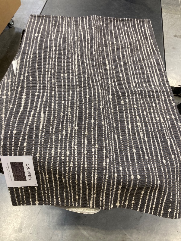Photo 1 of Calvin Klein accent rug with non skid backing, 30 x 45 inch
