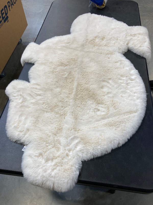 Photo 1 of Mon Chateau Faux Fur Shaped Rug, bunny