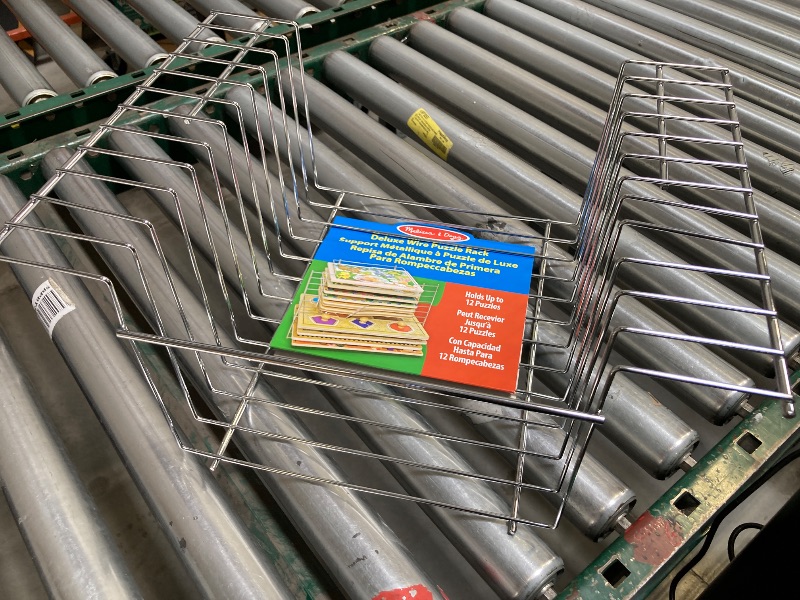 Photo 1 of Melissa & Doug Deluxe Metal Wire Puzzle Storage Rack for 12 Small and Large Puzzles