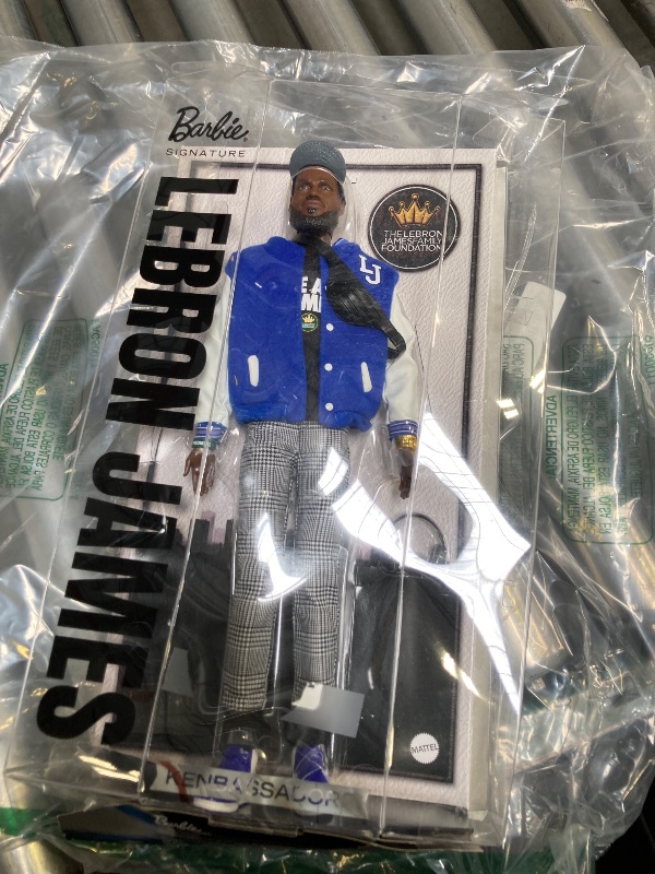 Photo 1 of Barbie Signature Lebron James Kenbassadors Doll Collectible with Varsity Bomber Jacket Outfit & Accessories Including Headphones, Sunglasses, & More