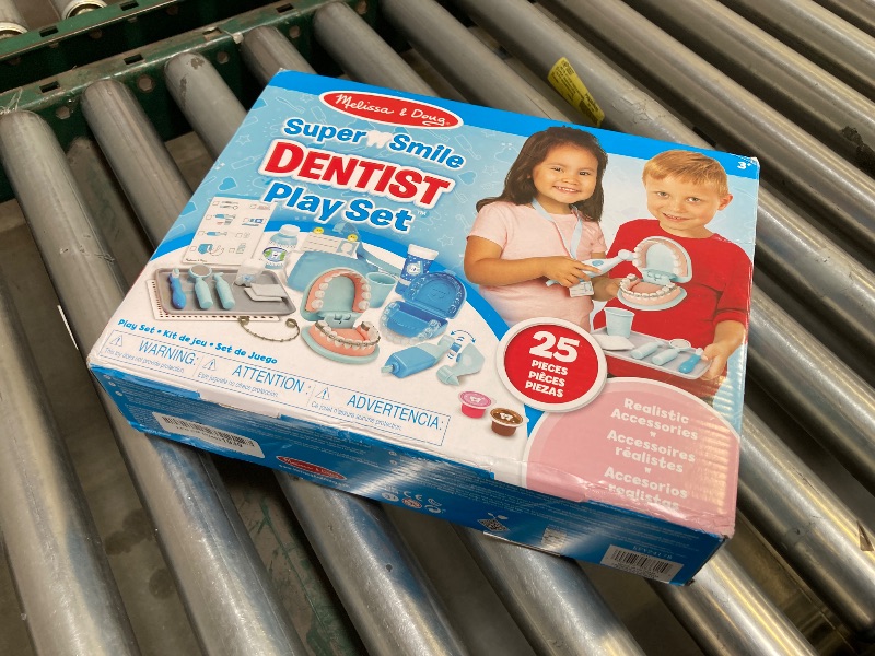 Photo 1 of Melissa & Doug Super Smile Dentist Kit With Pretend Play Set of Teeth And Dental Accessories (25 Toy Pieces) Pretend Dentist Play Set, For Kids Ages 3+
