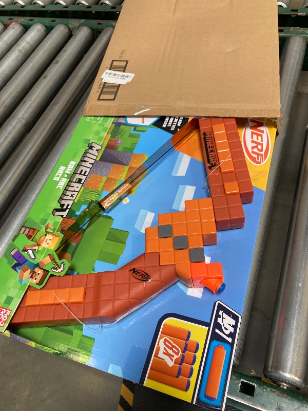 Photo 1 of Nerf Minecraft Bow Dart Blaster, Pull-Back String Priming, 8 Nerf N1 Compatible Only with N1 Dart Blasters, Ages 8+