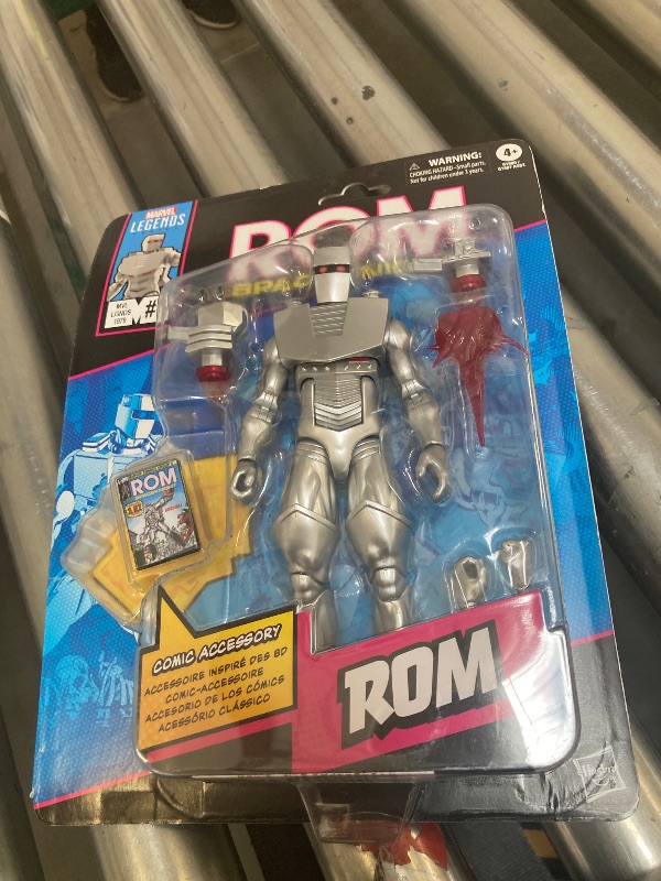 Photo 1 of Marvel Legends Series ROM: Spaceknight, Comics-Inspired Collectible 6-Inch Scale Action Figure with Character-Sized Comic Accessory