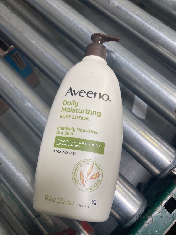 Photo 1 of Aveeno Daily Moisturizing Body Lotion, Body Lotion for Dry Skin with Prebiotic Oat, Paraben Free, Fragrance Free, Non-Greasy, Non-Comedogenic Moisturizer, 18 FL OZ