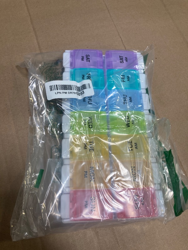 Photo 1 of Sukuos AM PM Weekly Pill Organizer 2 Times A Day, Large Daily Pill Box Case 7 Day with Easy Push Button Design, Detachable Medicine Holder for Vitamin/Fish Oil/Supplements (Rainbow)