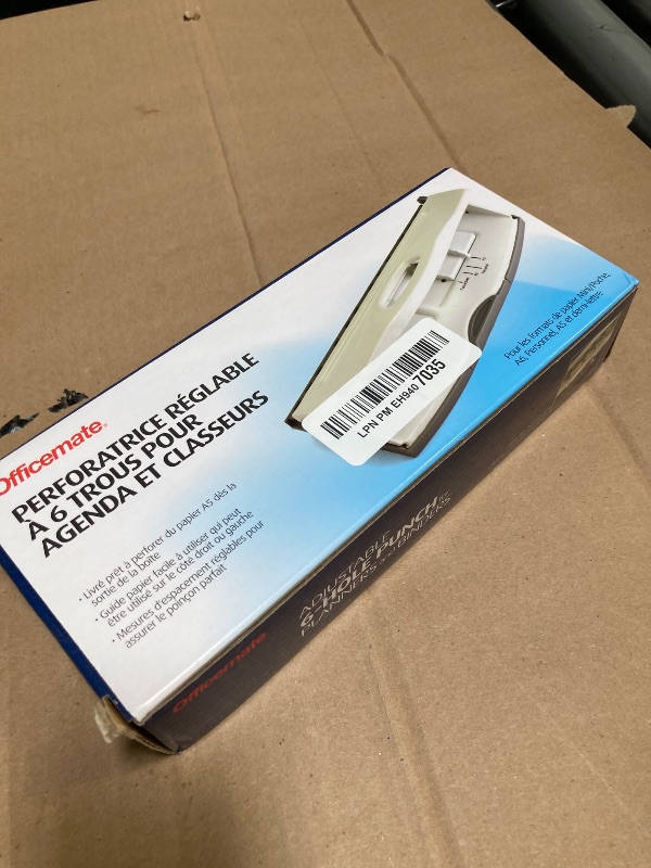 Photo 1 of Officemate Adjustable 6-Hole Punch for Planners and Binders, 8 Sheet Capacity, White (90162)