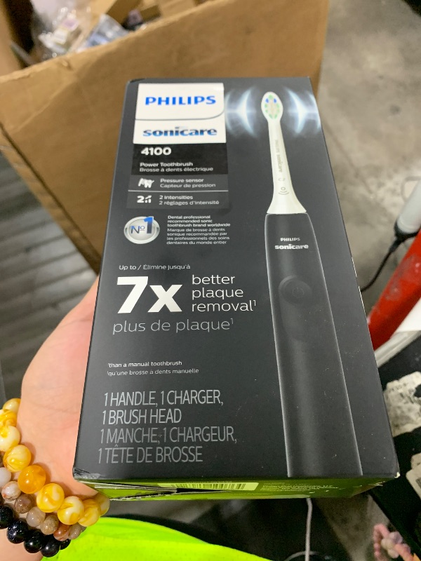 Photo 1 of Philips Sonicare 4100 Rechargeable Electric Toothbrush, with Pressure Sensor, 2 Intensity Settings, SmarTimer and QuadPacer, 14-Day Battery Life, Black, Model HX3681/24