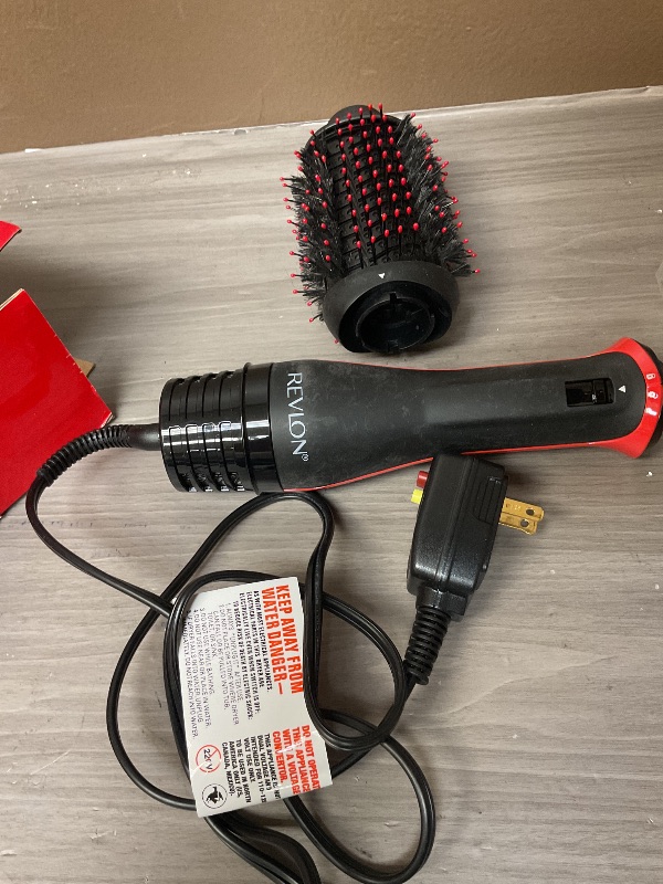 Photo 1 of REVLON One Step Volumizer PLUS Hair Dryer and Styler | More Volume, Less Damage, and More Styling Control for Easy and Fast Salon-Style Blowouts, Plus Travel Friendly (Black)