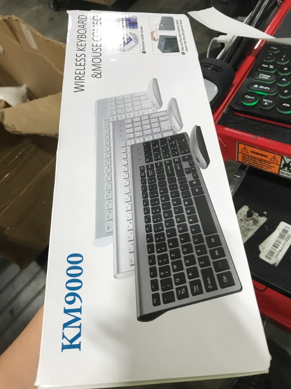 Photo 1 of Wireless Keyboard and Mouse Ultra Slim Combo, TopMate 2.4G Silent Compact USB 2400DPI Mouse and Scissor Switch Keyboard Set with Cover, 2 AA and 2 AAA Batteries, for PC/Laptop/Windows/Mac-Purple Black